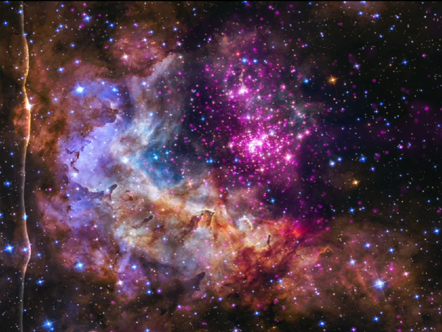 来自哈勃太空望远镜的观测数据（绿色和蓝色部分）揭示了恒星形成的厚密星云，钱德拉X射线探测器拍摄的紫色部分穿透了这片薄雾。